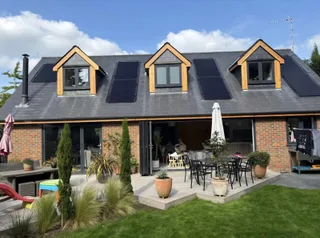 Front view of a house with solar installed by B Solar Energy